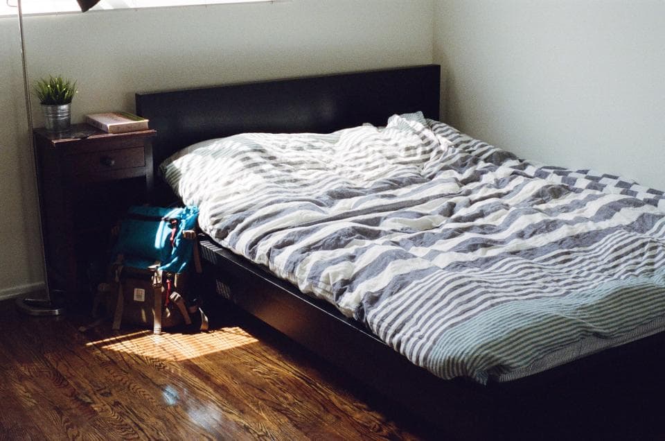 Clean, neutral bedroom after turn