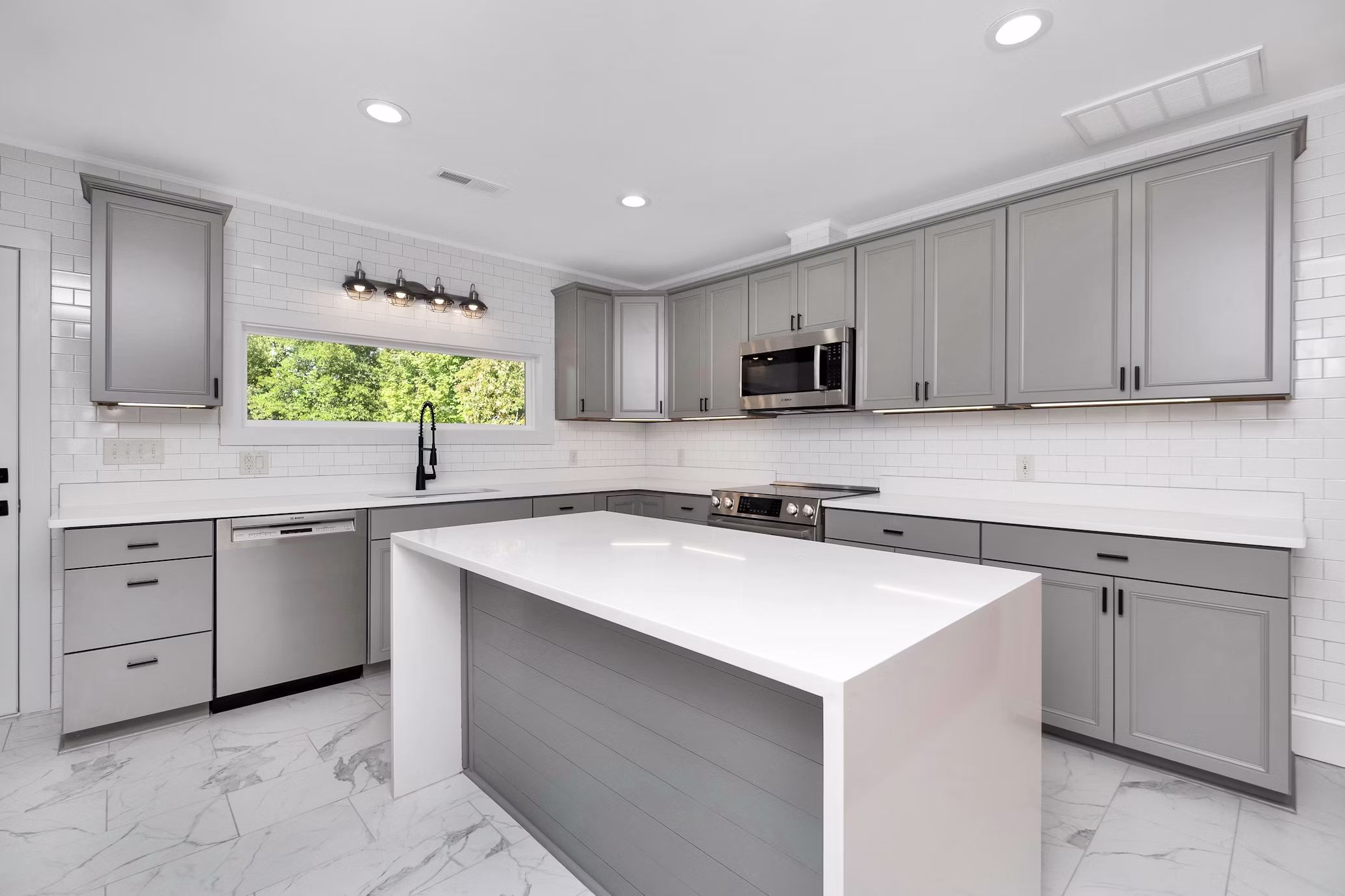 Remodeled kitchen with new cabinets and countertops